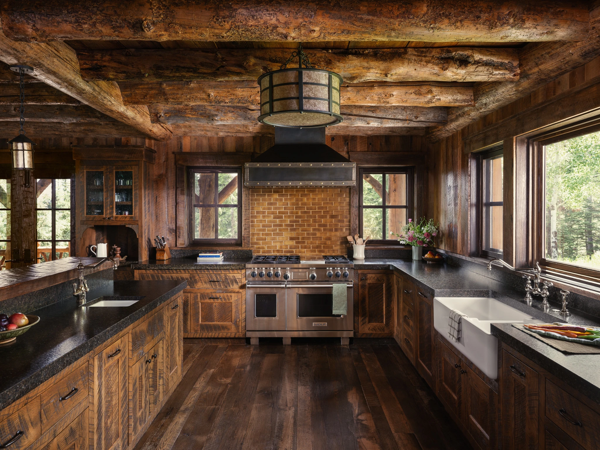 Kitchen with reclaimed timber beams — interior design photography Big Sky Montana, Pearson Design Group